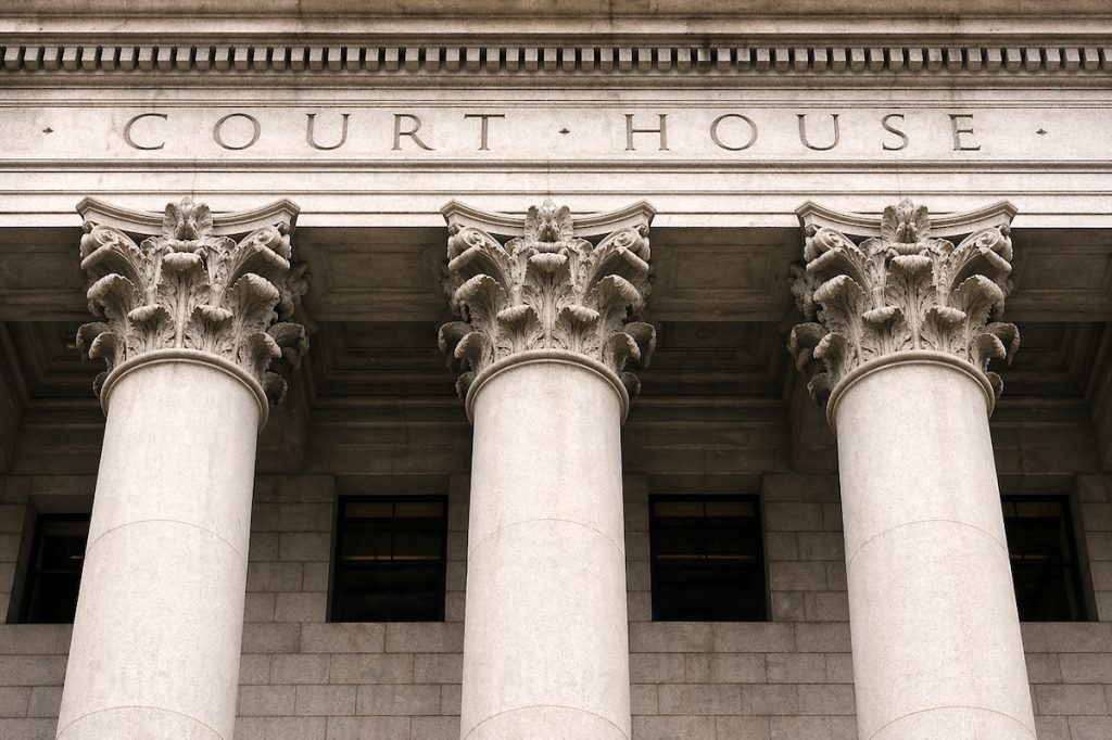 Miami courthouse columns representing civil litigation and court intervention for legal disputes